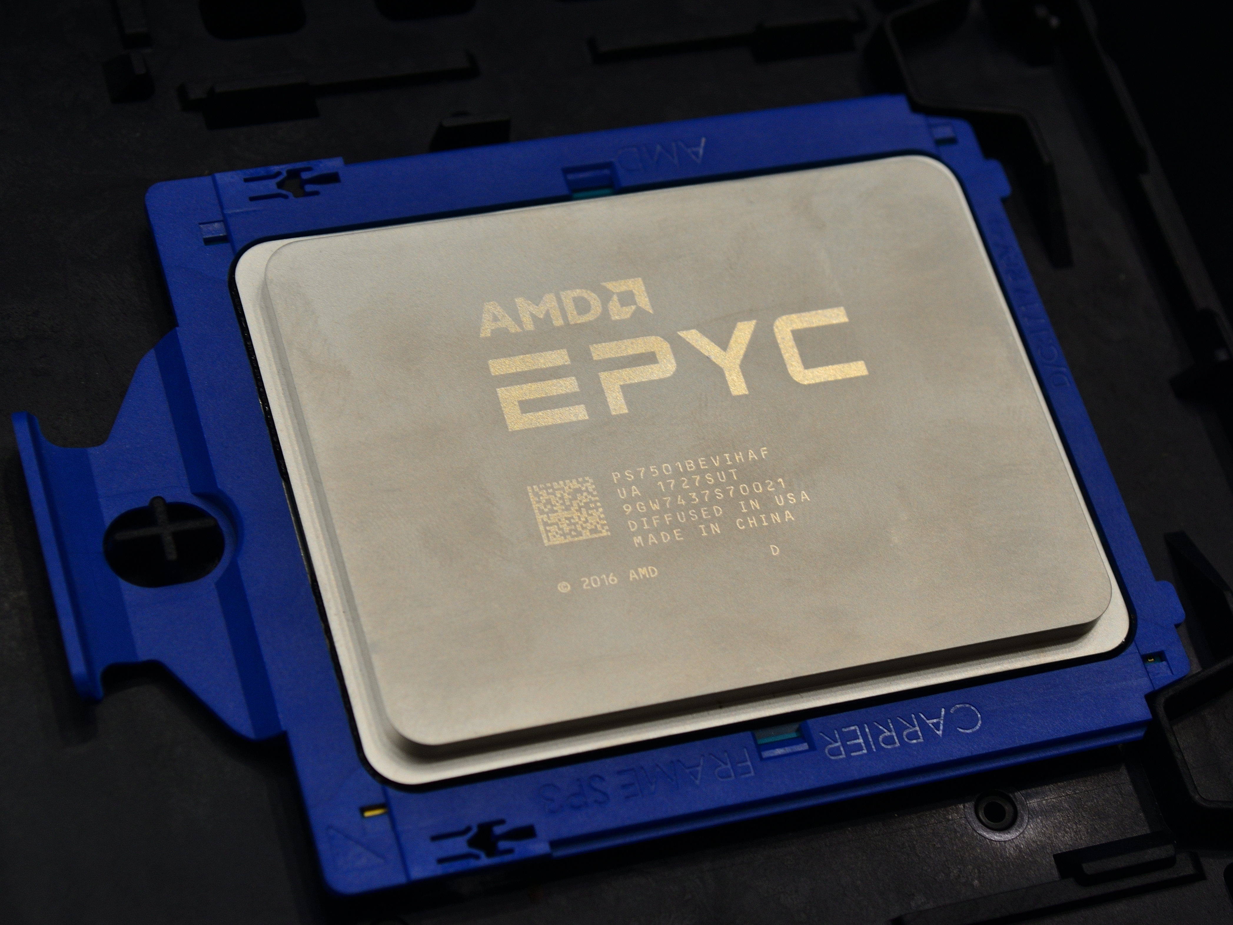 AMD EPYC 7501 processor engineering sample on a dark background